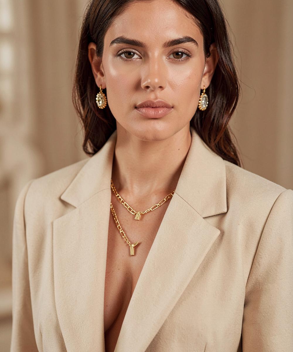 Model wearing LESAGEWEY gold jewellery